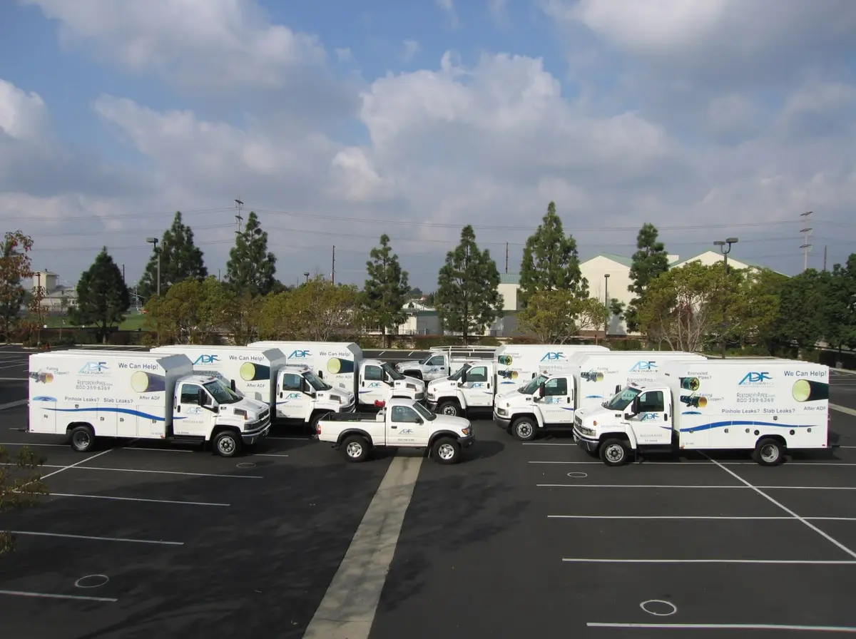 A parking lot showing a fleet of trucks